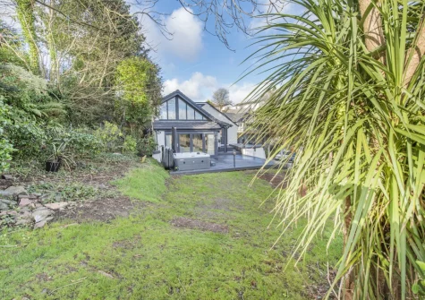 The decked patio, hot tub & enclosed garden at Y Llanw, Milford Haven