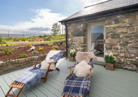 The decked terrace & outdoor sitting area at Ynys Cadno, Trawsfynydd