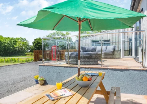 The patio, alfresco dining & outdoor sitting area at Yr Hen Barlwr, Talwrn