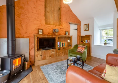 The living room at Yr Hen Ysgubor, Sarn Meyllteyrn