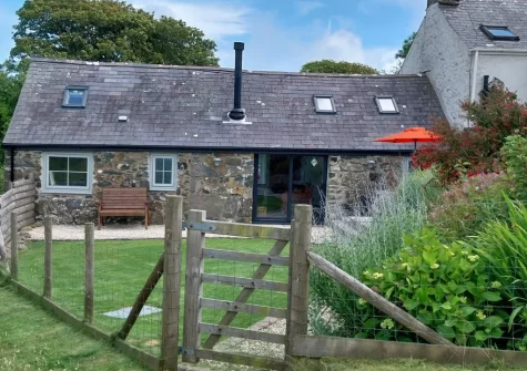 Yr Hen Ysgubor's fully enclosed landscaped cottage garden with far reaching views